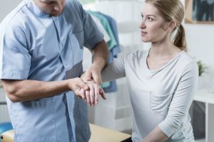 Woman wrist personal injury physio image